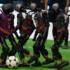 Robots Collapse, Glitch, and Get Stretchered Off in World’s First AI-Powered Football Match World Humanoid Robot Games China Bejing